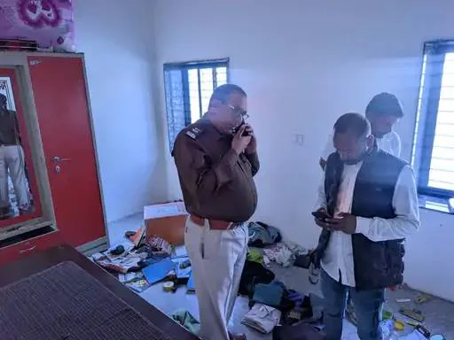 A woman was held hostage at knifepoint in her home and her eyes were blinded with a chemical spray.