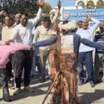 Jhunjhunu farmers protest: Trump's effigy burnt in protest against foreign trade policies Jhunjhunu farmers protest: Trump's effigy burnt in protest against foreign trade policies